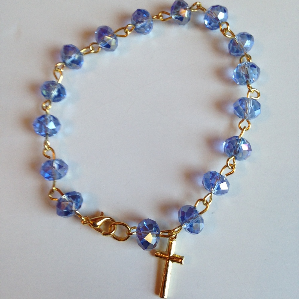 LIGHT BLUE BRACELET WITH GOLD CROSS